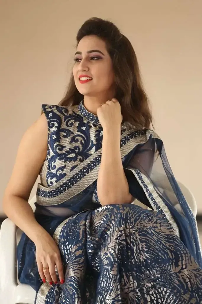 TV Anchor Manjusha Back Showing Images In Blue Saree